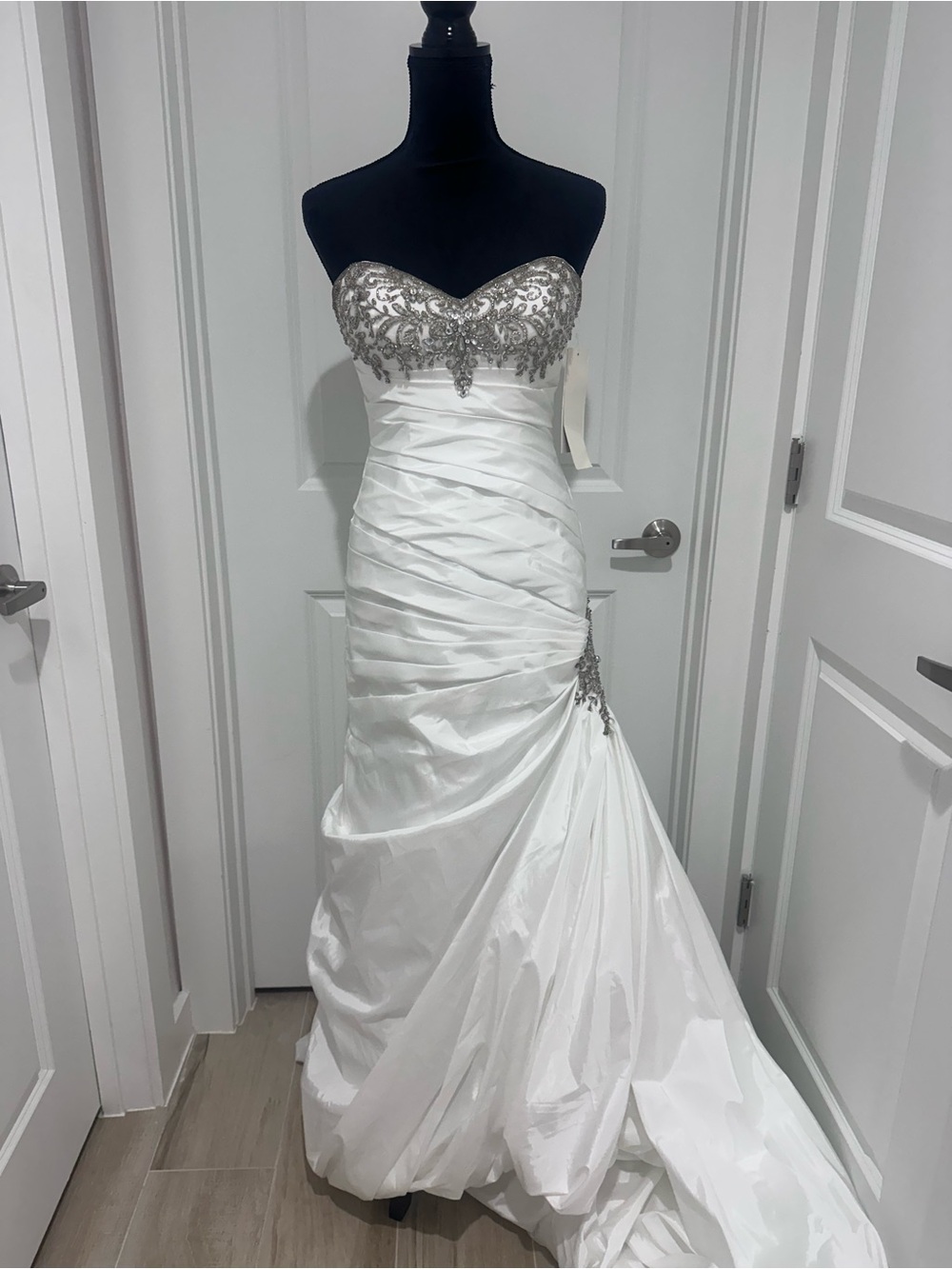 David’s Bridal strapless White Bridal Gown with Silver Beaded size 4 petite